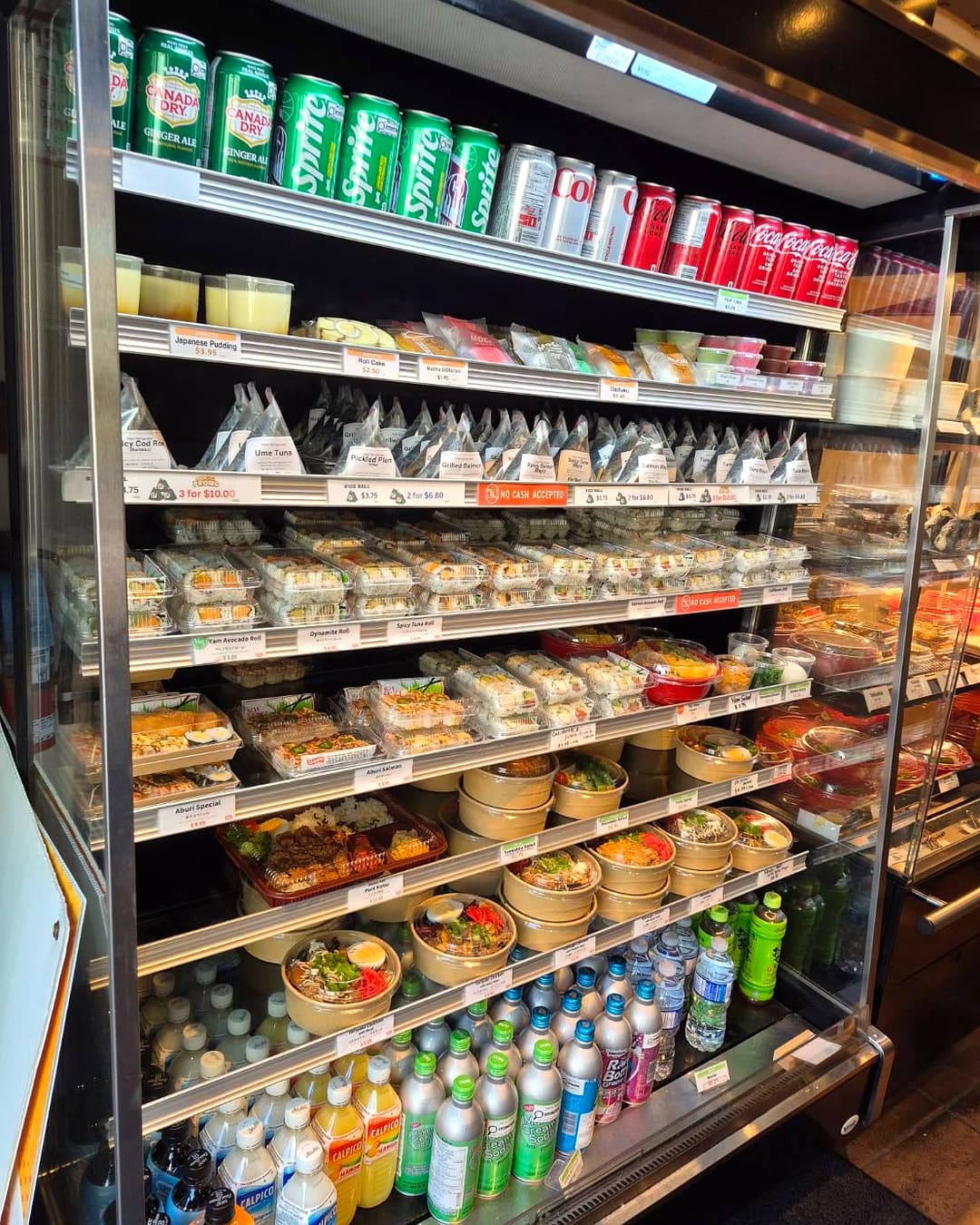Grab & Go cooler — onigiri, sushi rolls, bowls and drinks